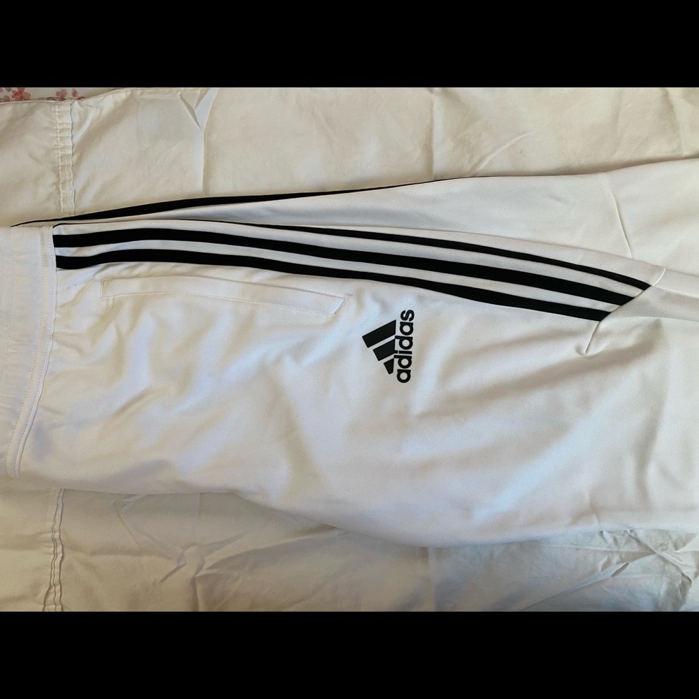 White Adidas pants with black strips